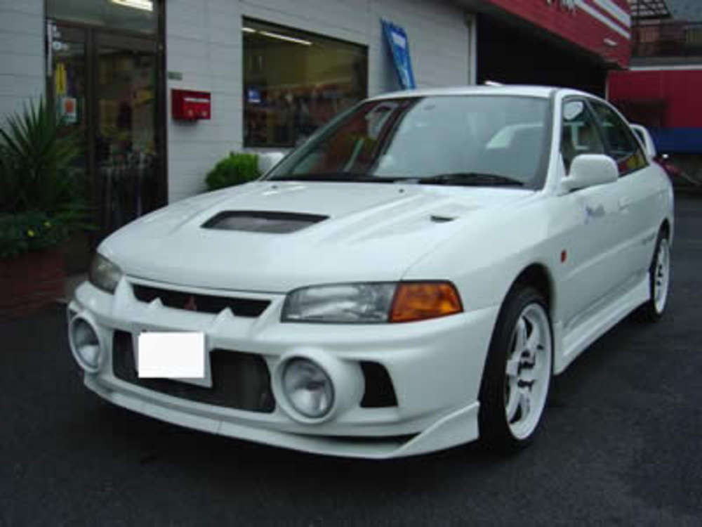 Mitsubishi Lancer Evolution IV: 9 фото